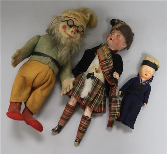 A felt gnome and two other dolls,